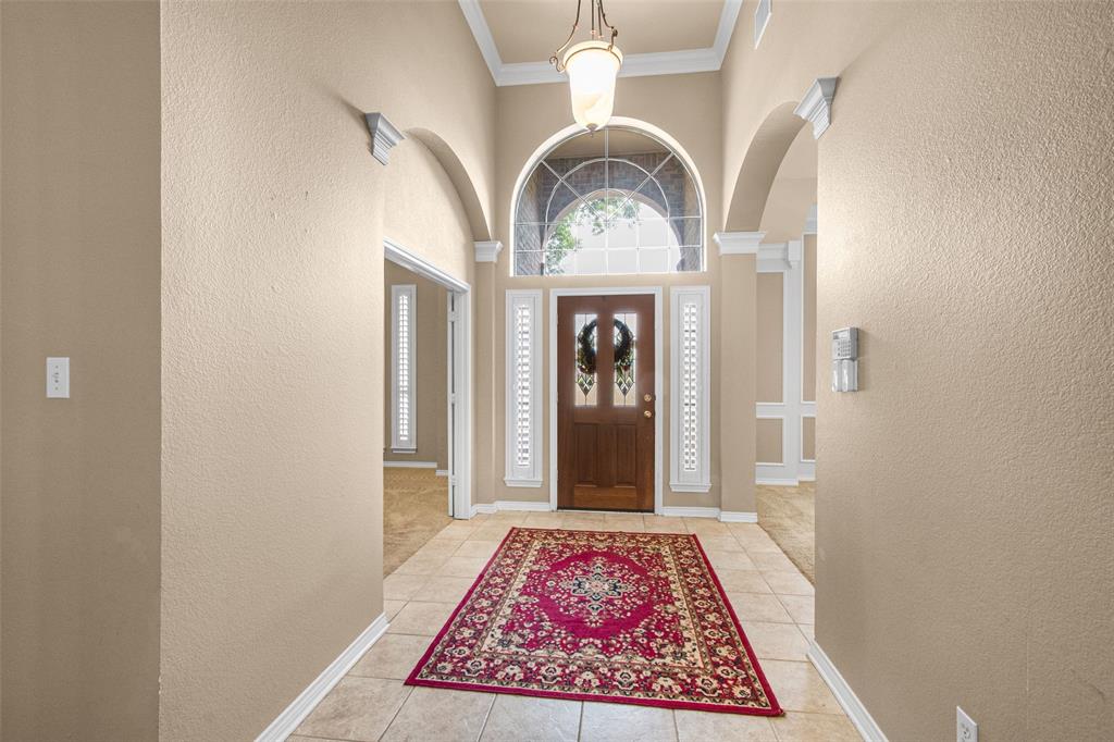 850 Turquoise Point Rockwall, TX 75032 - Photo 4 of 40 a view of an entryway with a rug