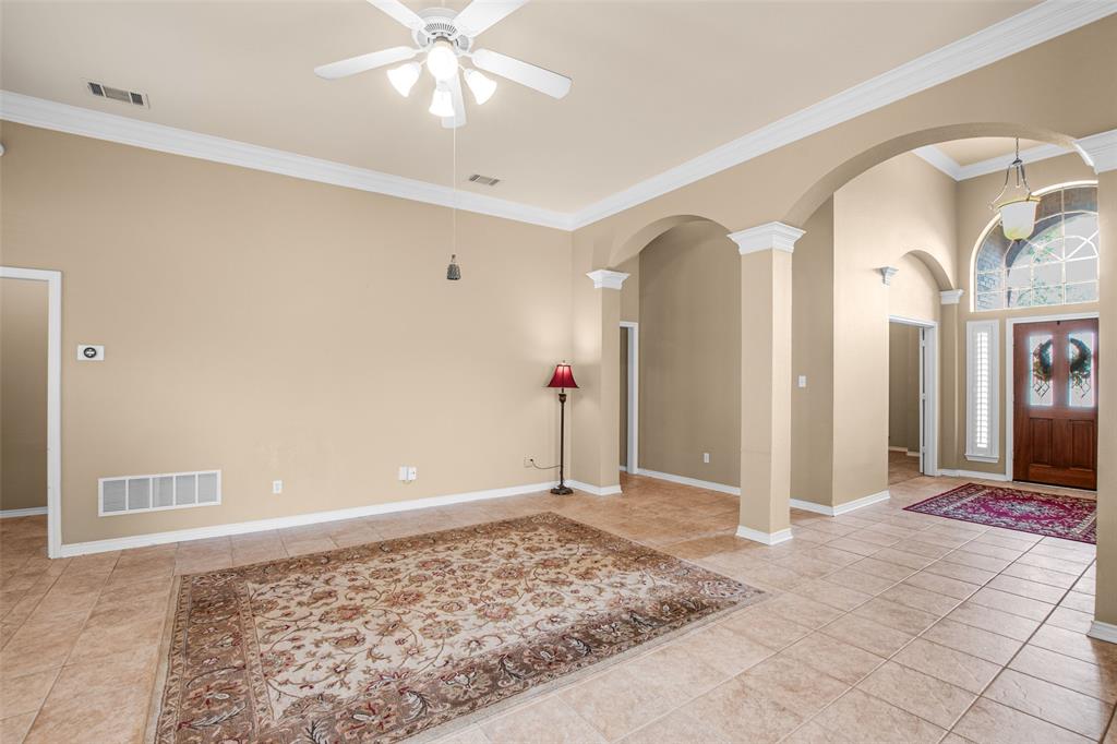 850 Turquoise Point Rockwall, TX 75032 - Photo 7 of 40 a view of a livingroom with wooden floor and cabinet