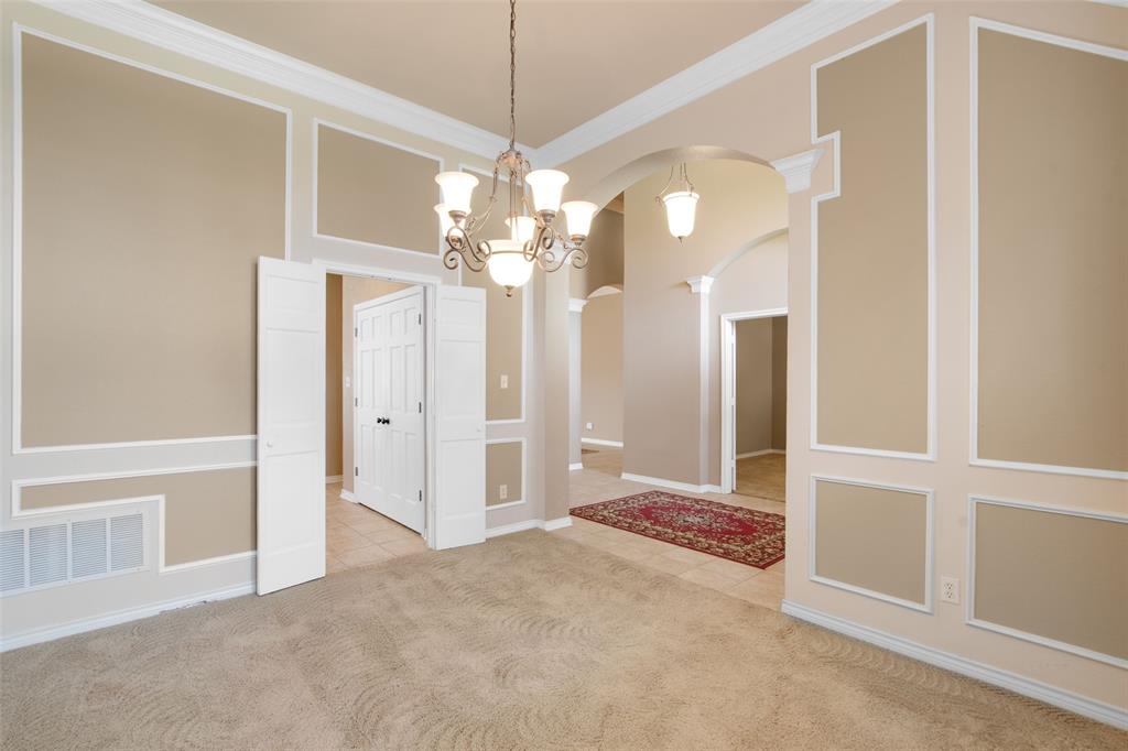 850 Turquoise Point Rockwall, TX 75032 - Photo 10 of 40 a view of a chandelier in a room with a chandelier