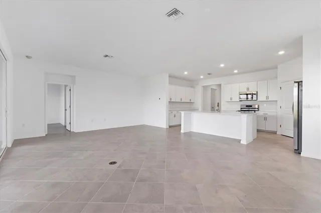 an empty room with windows