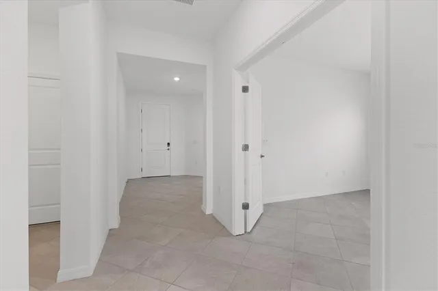 a view of street with potted plants