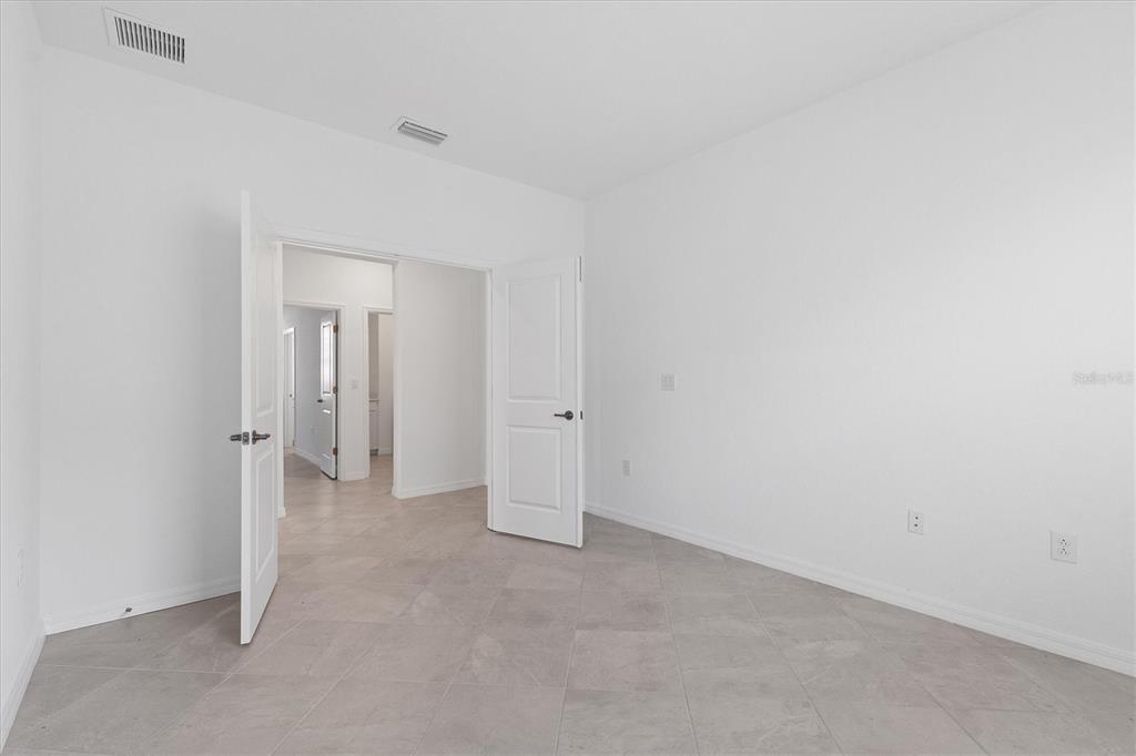 19095 Cabernet Court Venice, FL 34293 - Photo 26 of 76 a view of empty room