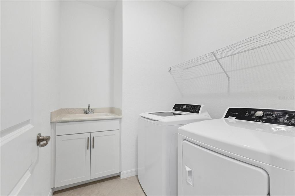 19095 Cabernet Court Venice, FL 34293 - Photo 27 of 76 a utility room with dryer and washer