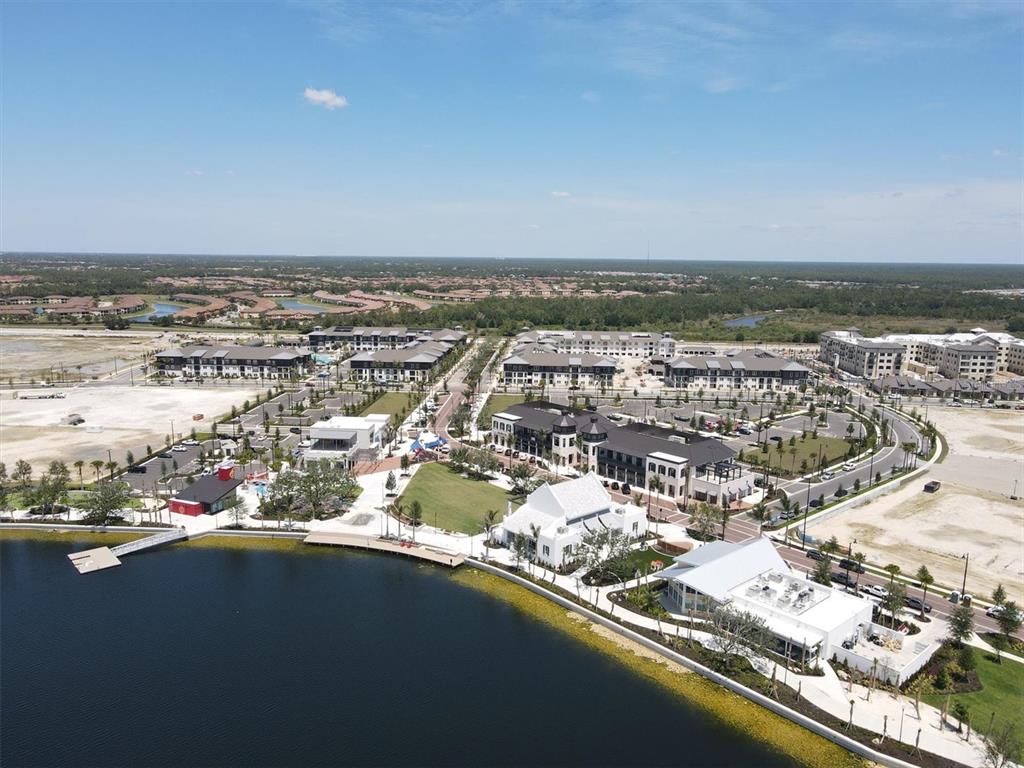 19095 Cabernet Court Venice, FL 34293 - Photo 76 of 76 an aerial view of residential building and ocean view