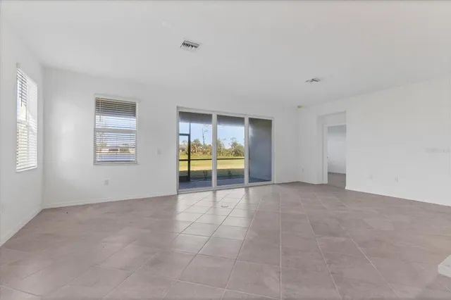 a bathroom with a shower and a sink