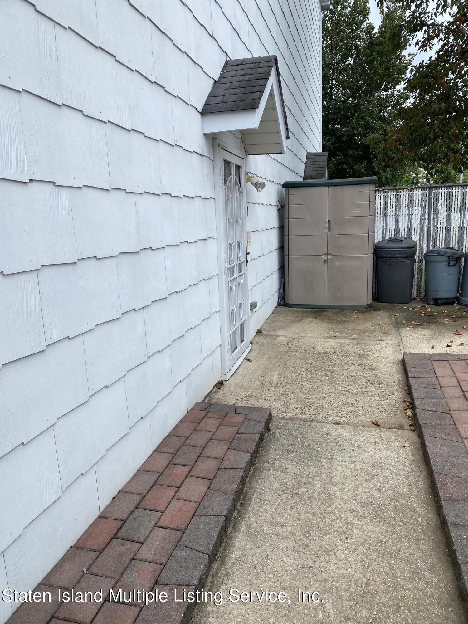 34 Hart Loop Staten Island, NY 10306 - Photo 2 of 17 Side Entrance