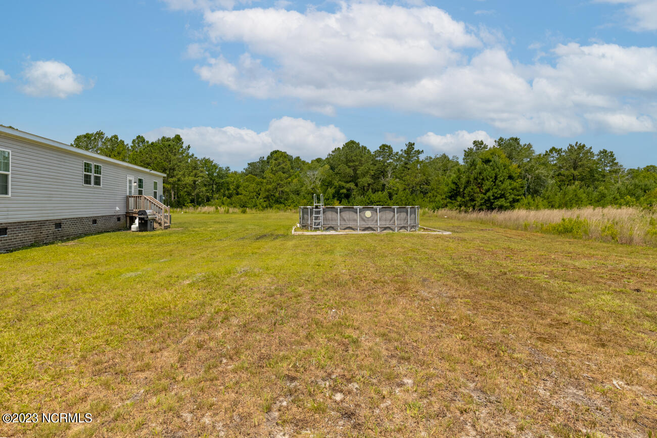 142 Davis Road Richlands, NC 28574 - Photo 32 of 34 Back yard with Salt Water Pool!
