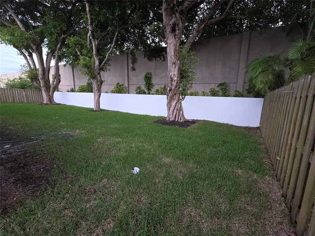 a view of a garden with a tree