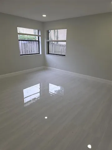 an empty room with windows