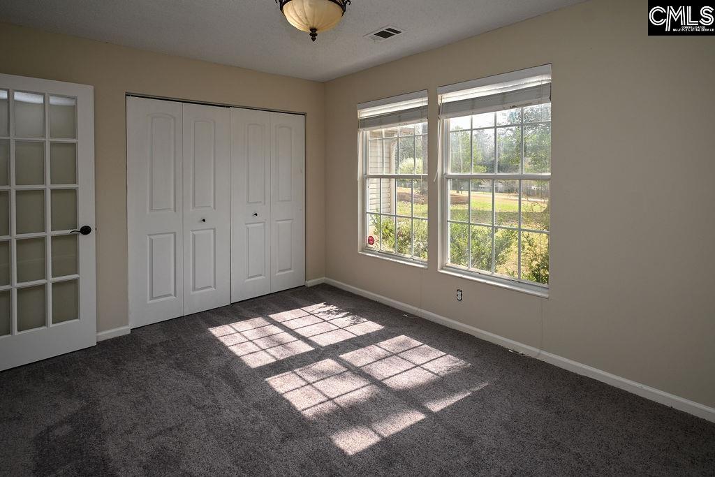 88 Running Deer Road Blythewood, SC 29016 - Photo 15 of 24 an empty room with windows