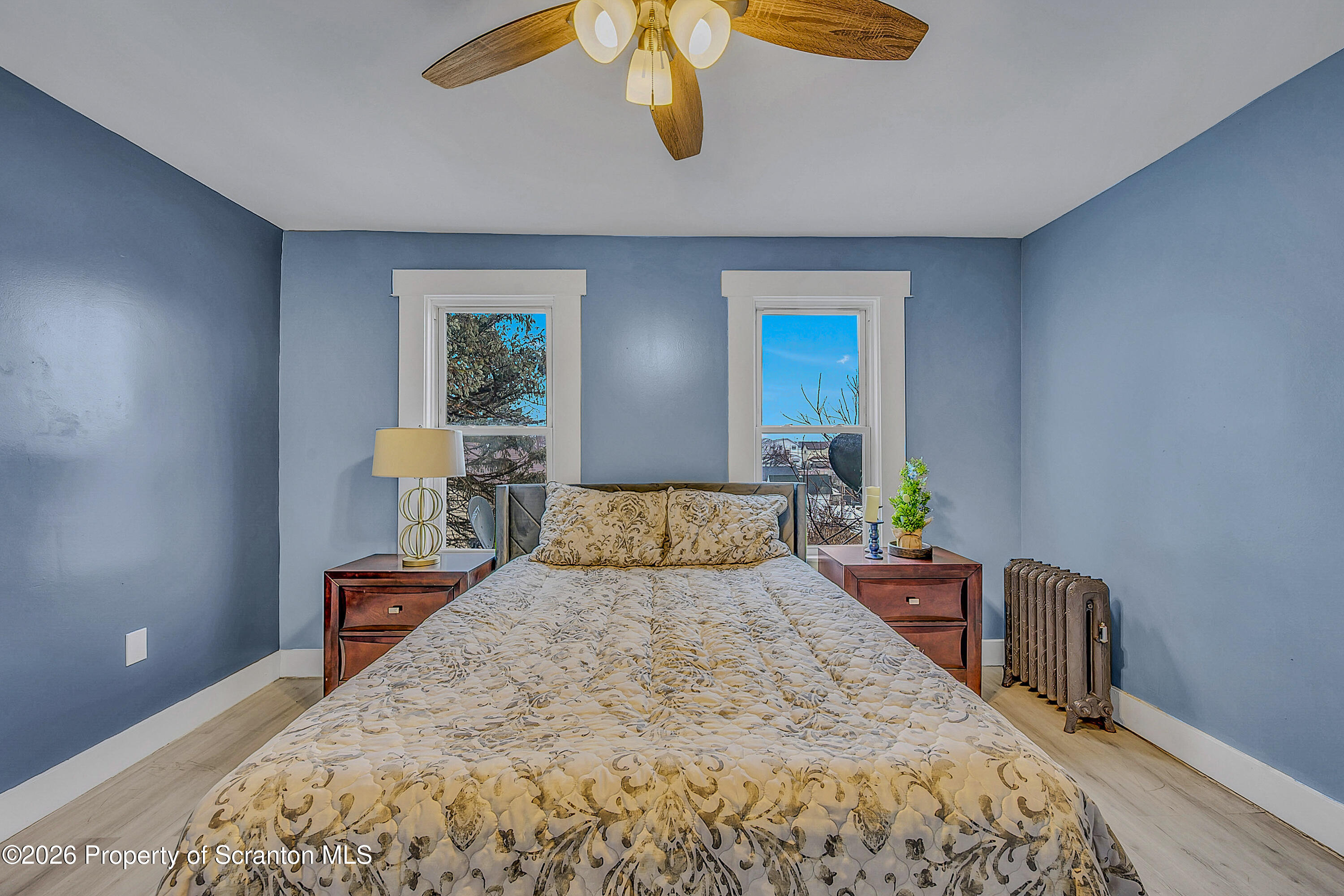 215 North Fillmore Avenue Scranton, PA 18504 - Photo 13 of 25 a bedroom with a bed a dresser and window
