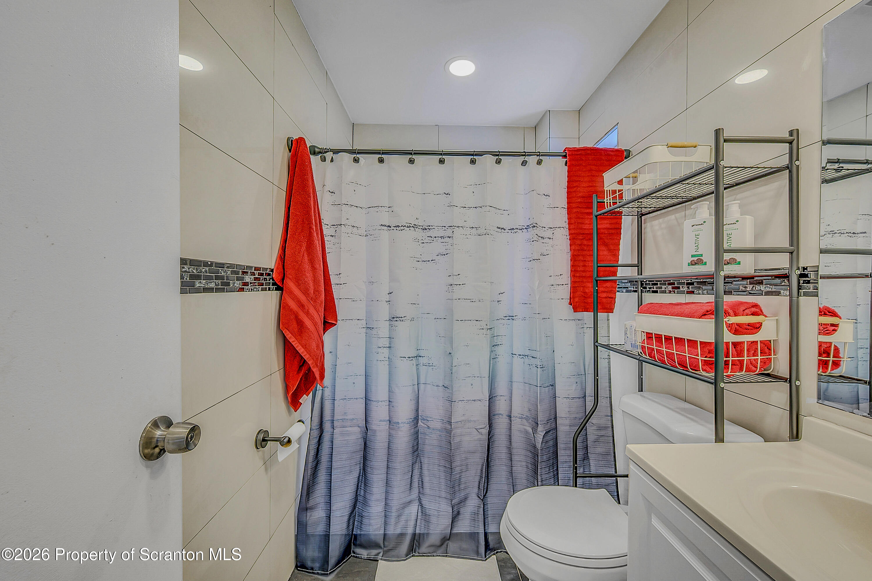 215 North Fillmore Avenue Scranton, PA 18504 - Photo 19 of 25 a bathroom with a toilet and a shower