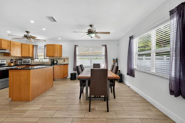 a view of a backyard with pathway