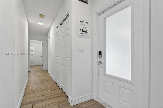 a bed room with a bed and a window