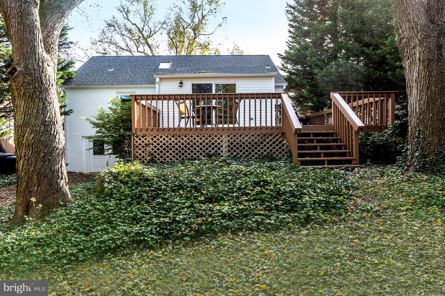 307 Gibson Road Annapolis, MD 21401 - Photo 2 of 31 Rear Tree-Shaded Deck and Level Yard