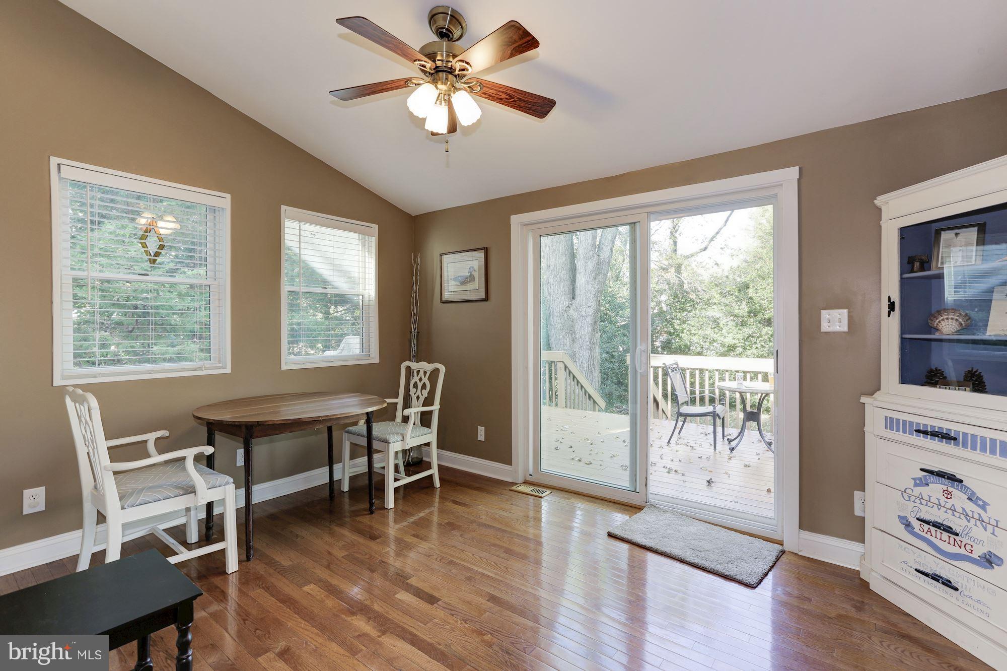307 Gibson Road Annapolis, MD 21401 - Photo 14 of 31 Vaulted Dining Area with Sliders to Deck