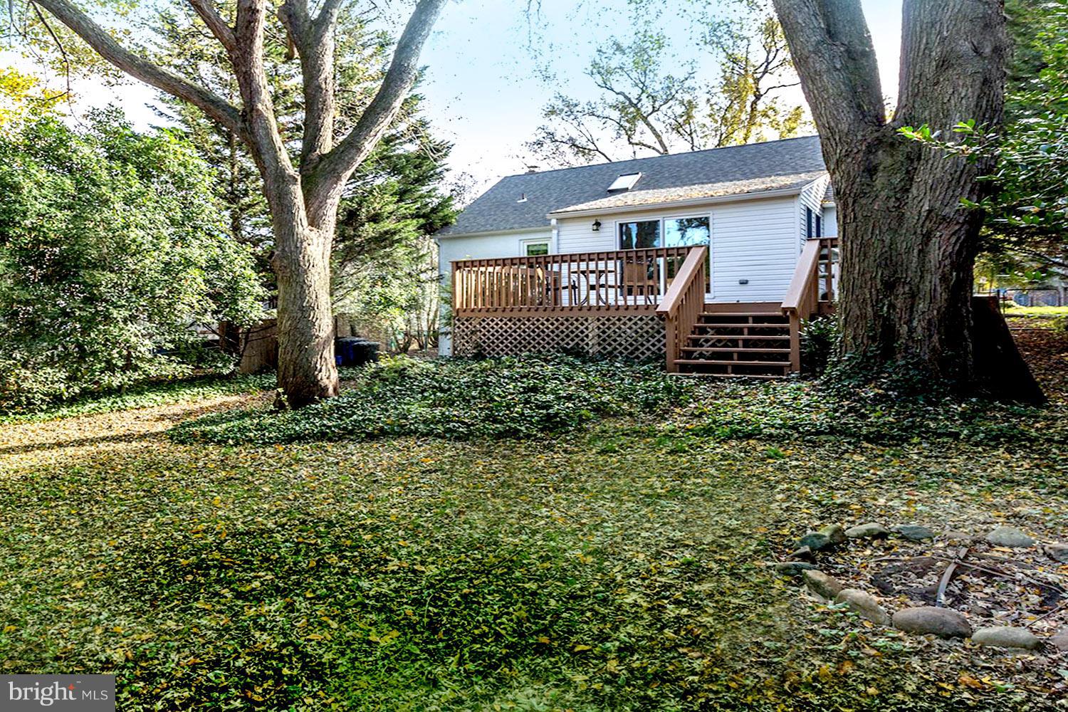 307 Gibson Road Annapolis, MD 21401 - Photo 16 of 31 Steps to Tree-Bordered Yard with Fire Pit