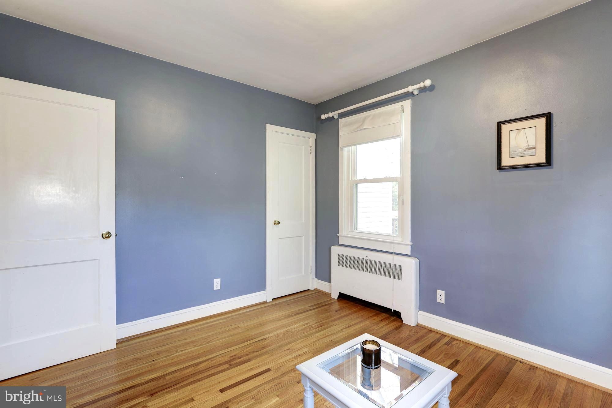 307 Gibson Road Annapolis, MD 21401 - Photo 21 of 31 Bright 2nd Bedroom . Upper Level Wood Floors