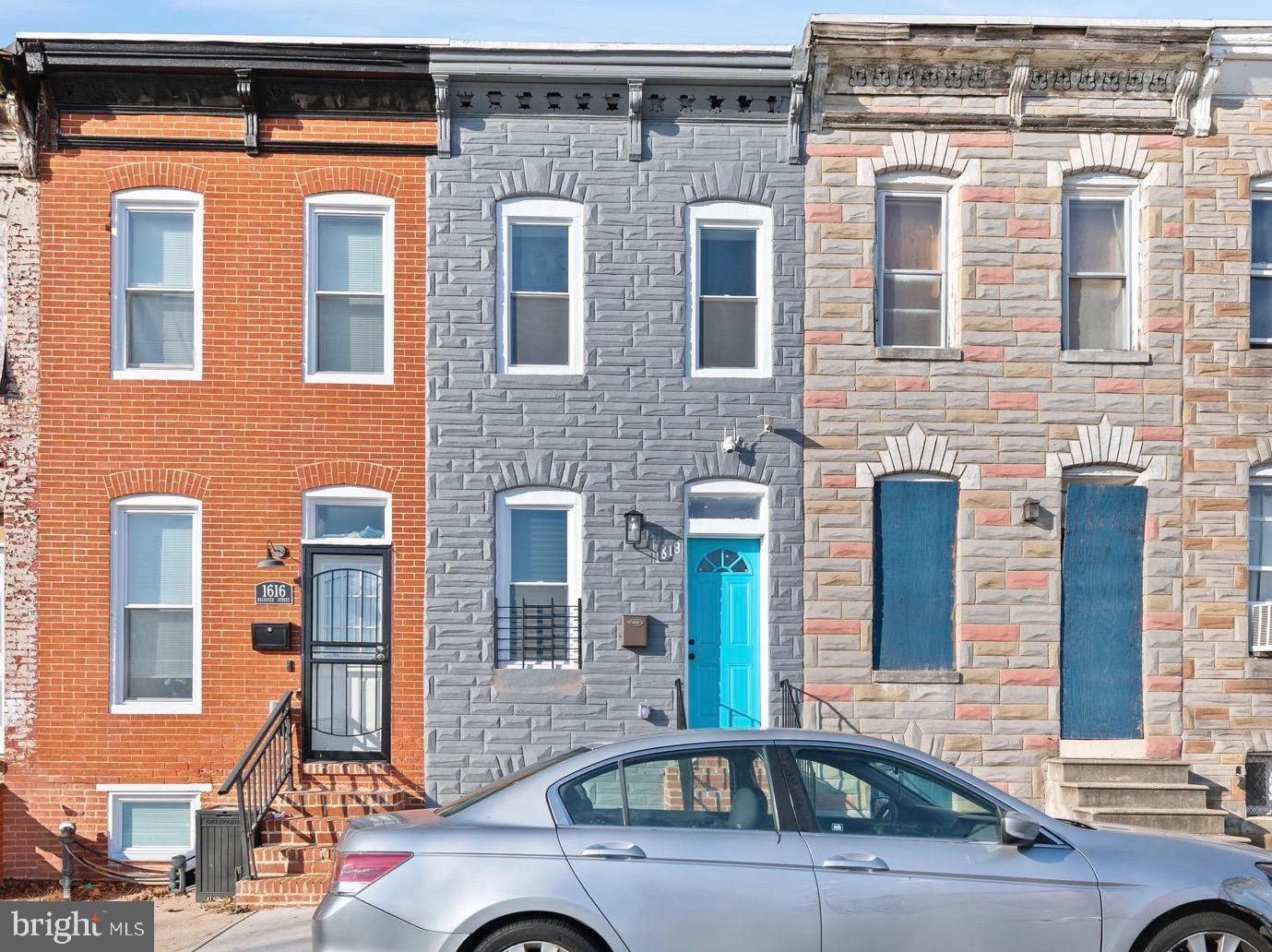 1618 North Regester Street Baltimore, MD 21213 - Photo 3 of 29 a view of a car parked in front of a building