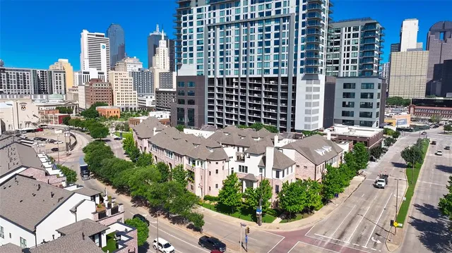 a view of city with tall buildings