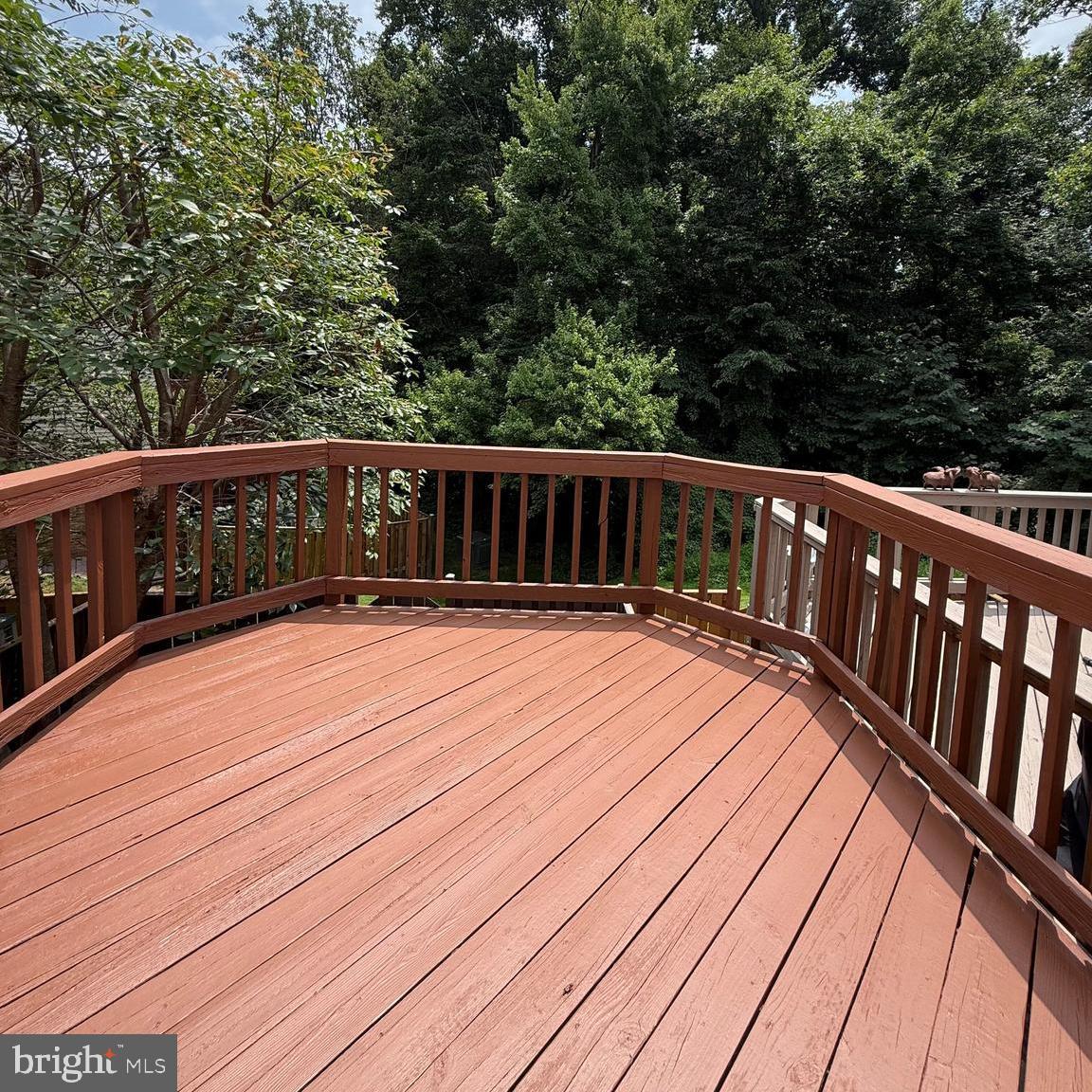 8442 Springfield Oaks Drive Springfield, VA 22153 - Photo 30 of 31 a view of balcony with wooden floor and fence