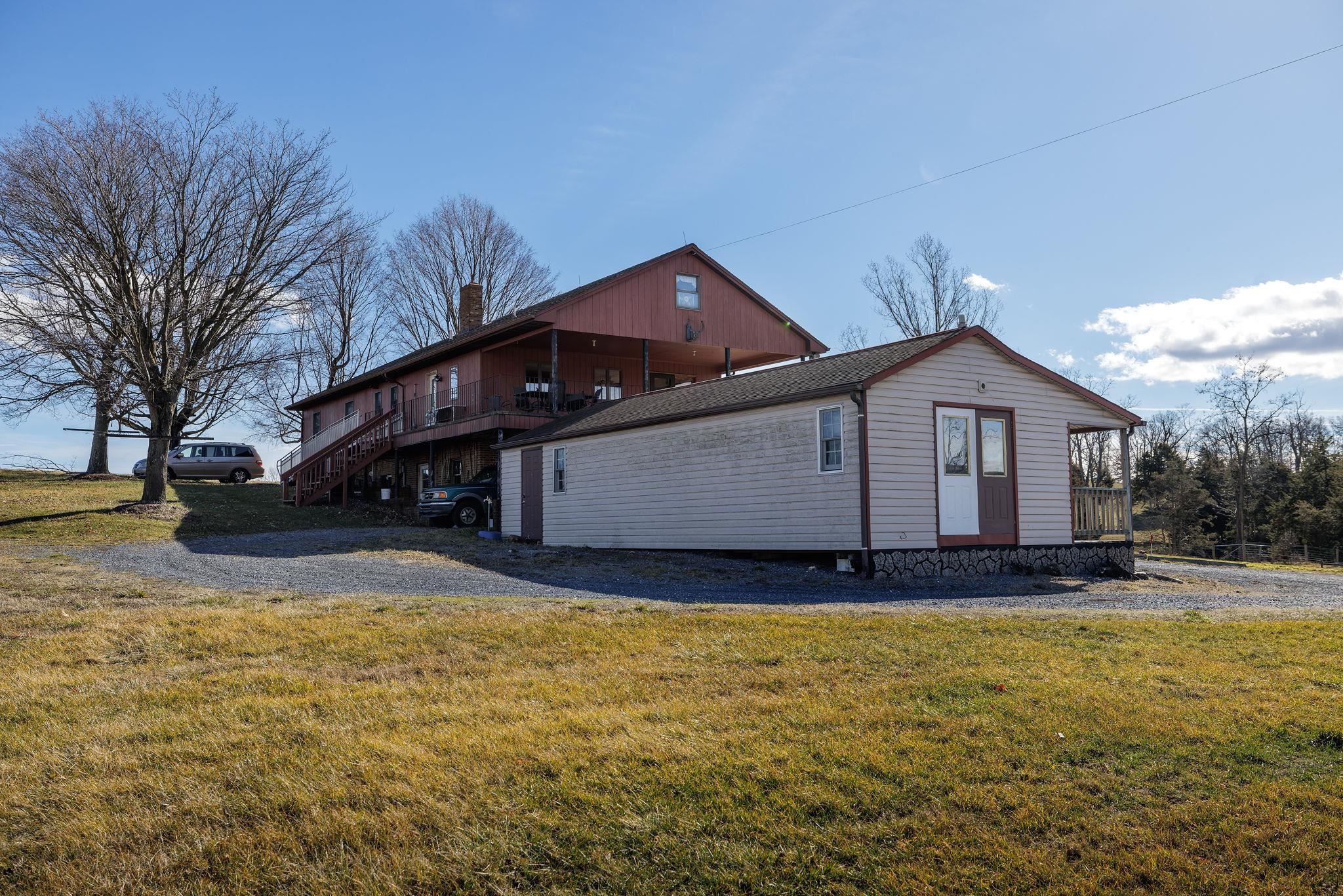 85-87 Curry Road Mount Solon, VA 22843 - Photo 14 of 59 a front view of a house with a yard