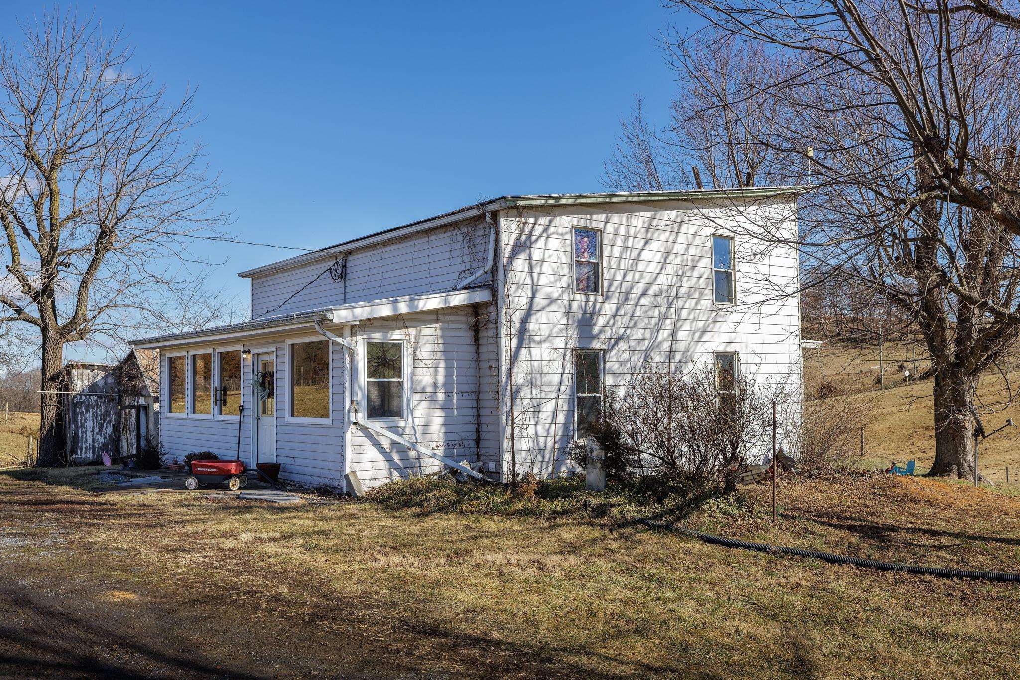 85-87 Curry Road Mount Solon, VA 22843 - Photo 32 of 59 a view of a house with a yard
