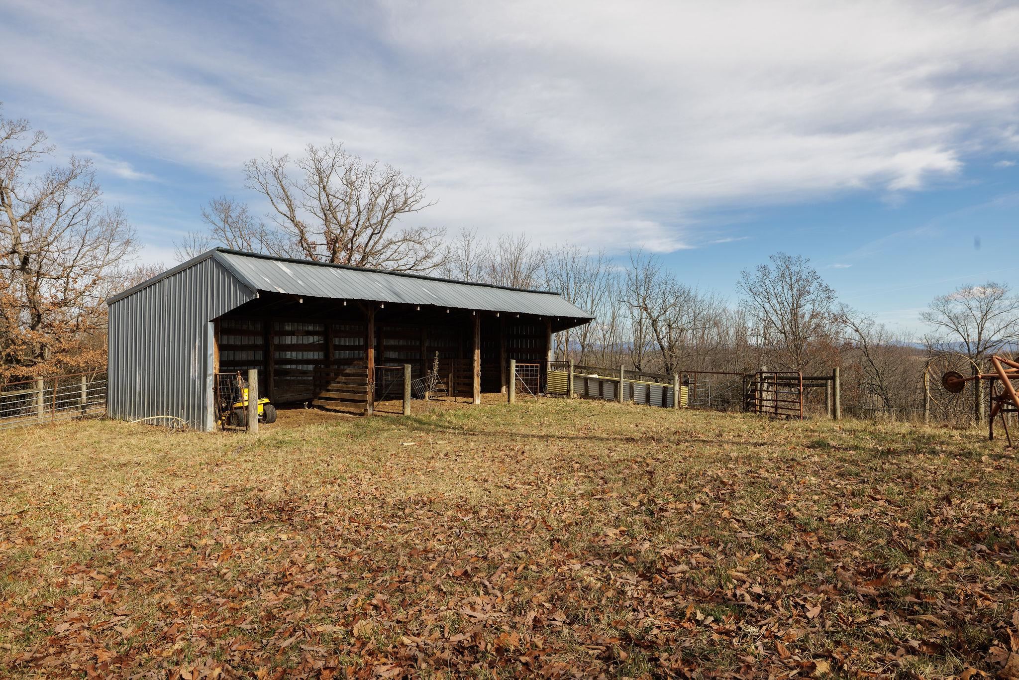 85-87 Curry Road Mount Solon, VA 22843 - Photo 43 of 59 a front view of a house with a yard