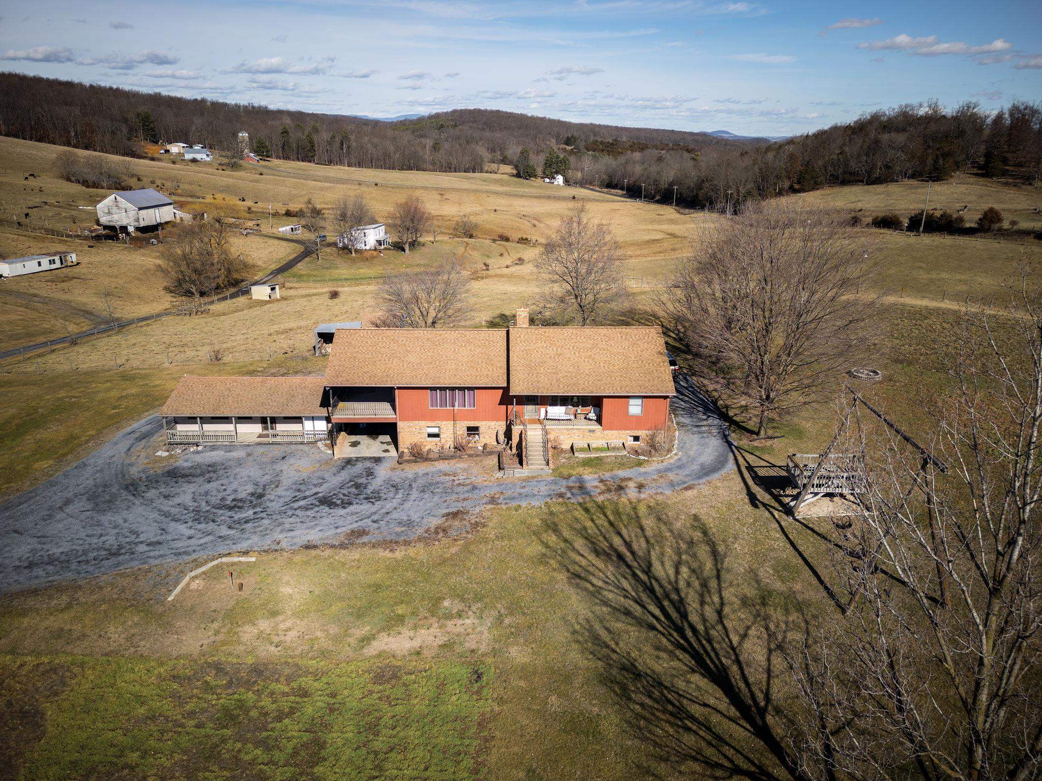 85-87 Curry Road Mount Solon, VA 22843 - Photo 10 of 59 a view of a lake with a mountain