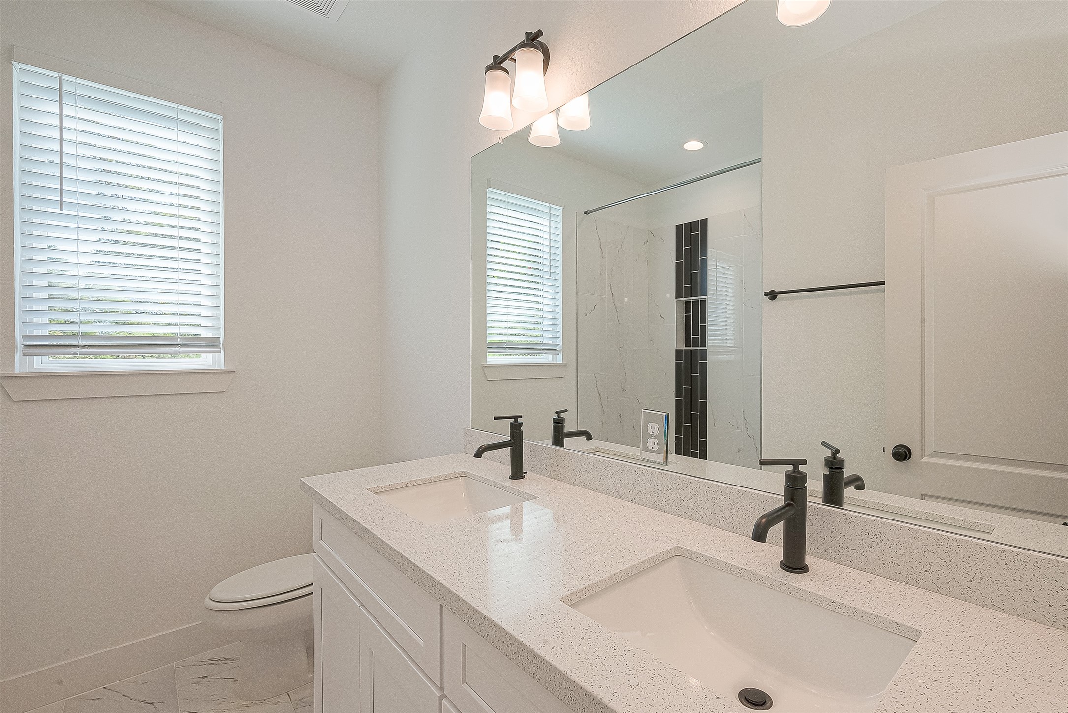 13419 Scott Street Houston, TX 77047 - Photo 16 of 23 a bathroom with a sink and a toilet