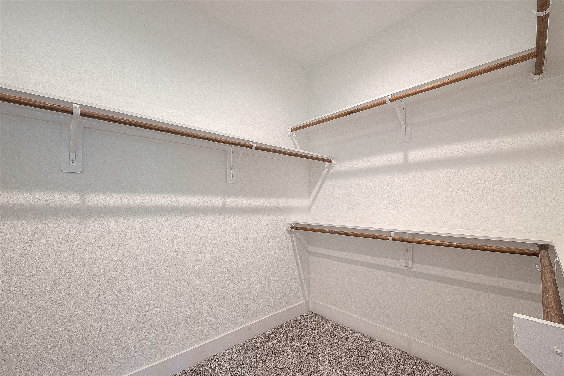 13419 Scott Street Houston, TX 77047 - Photo 20 of 23 a view of an empty walk in closet