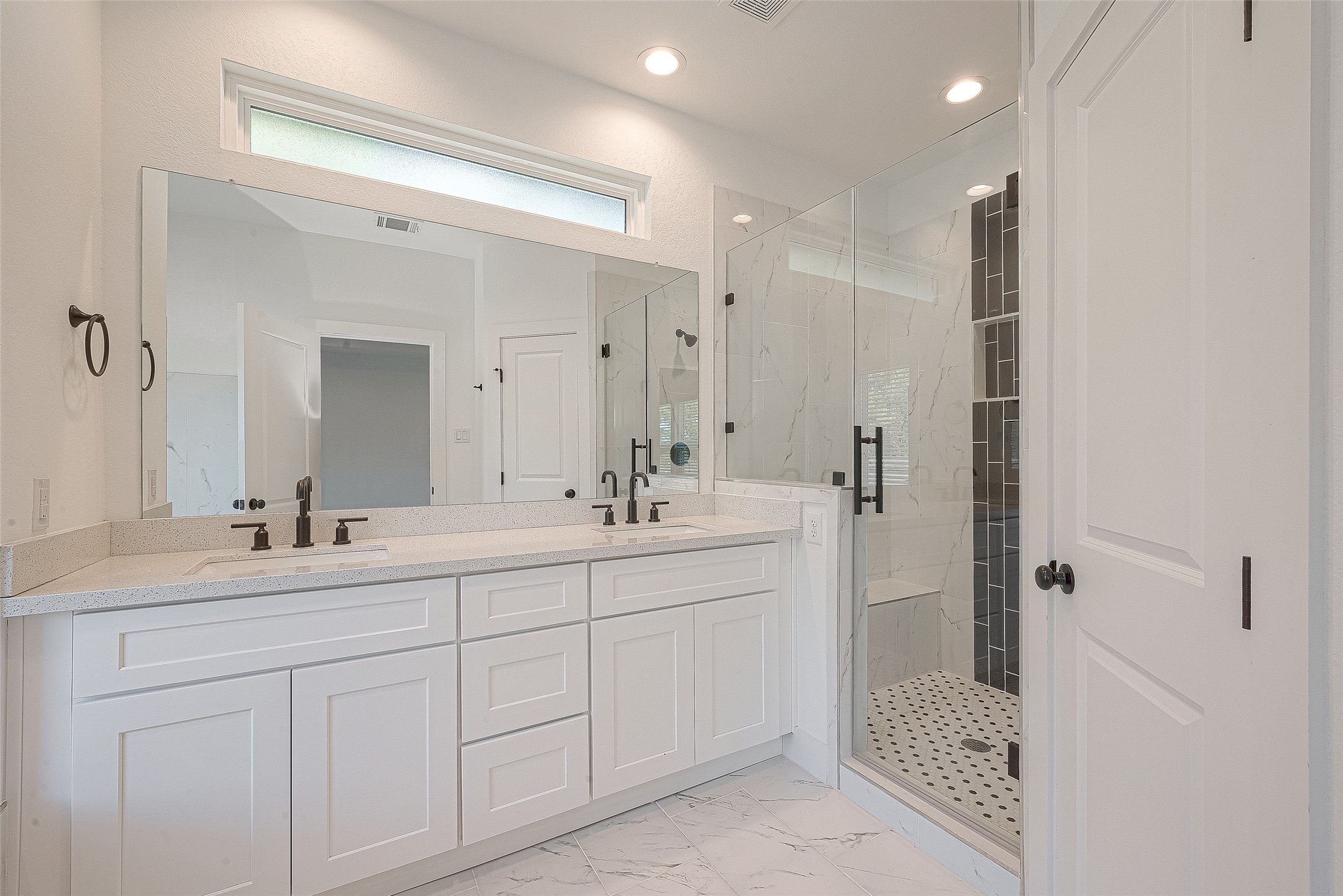 13419 Scott Street Houston, TX 77047 - Photo 21 of 23 a bathroom with a double vanity sink mirror and shower
