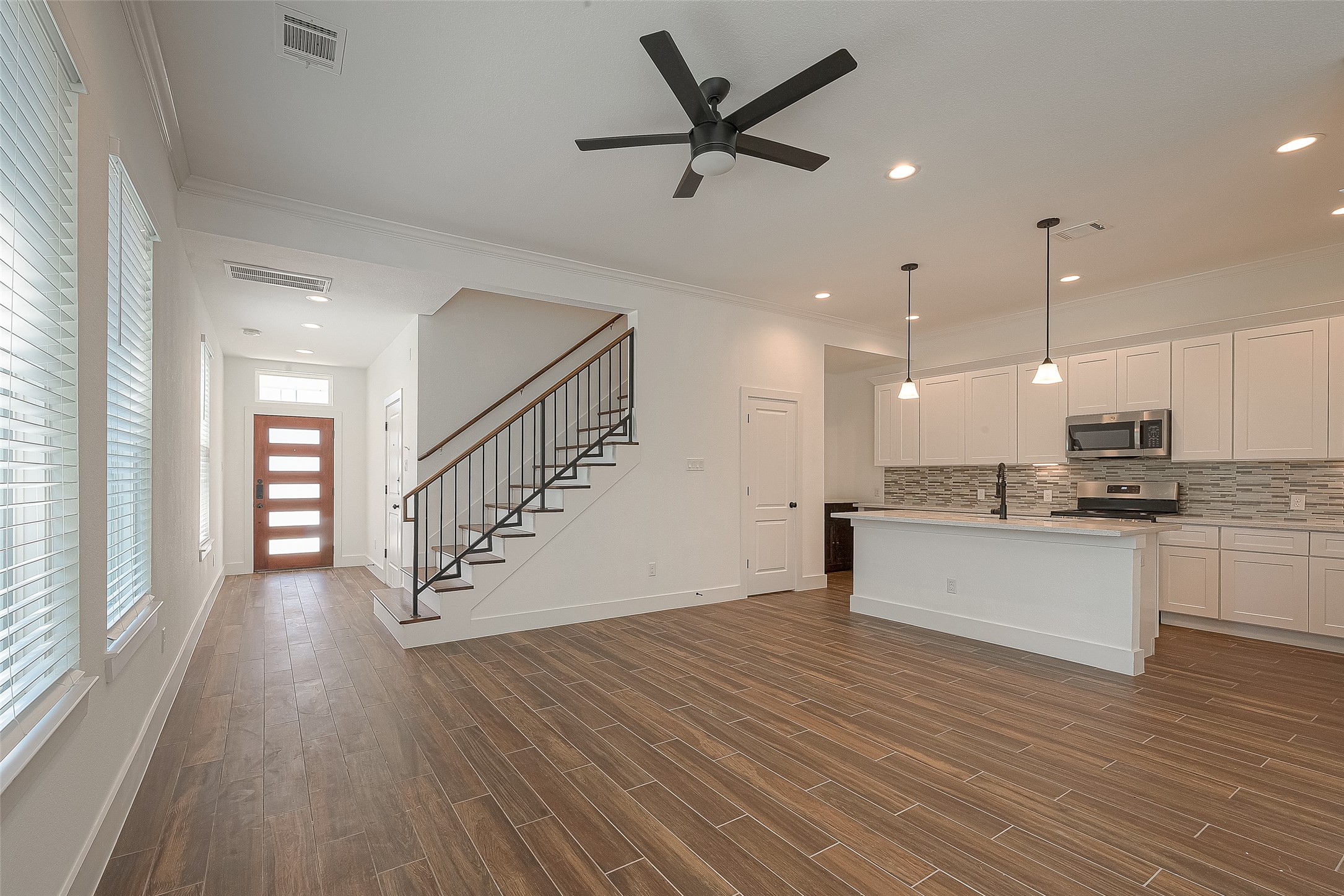 13419 Scott Street Houston, TX 77047 - Photo 5 of 23 a view of kitchen with sink and wooden floor