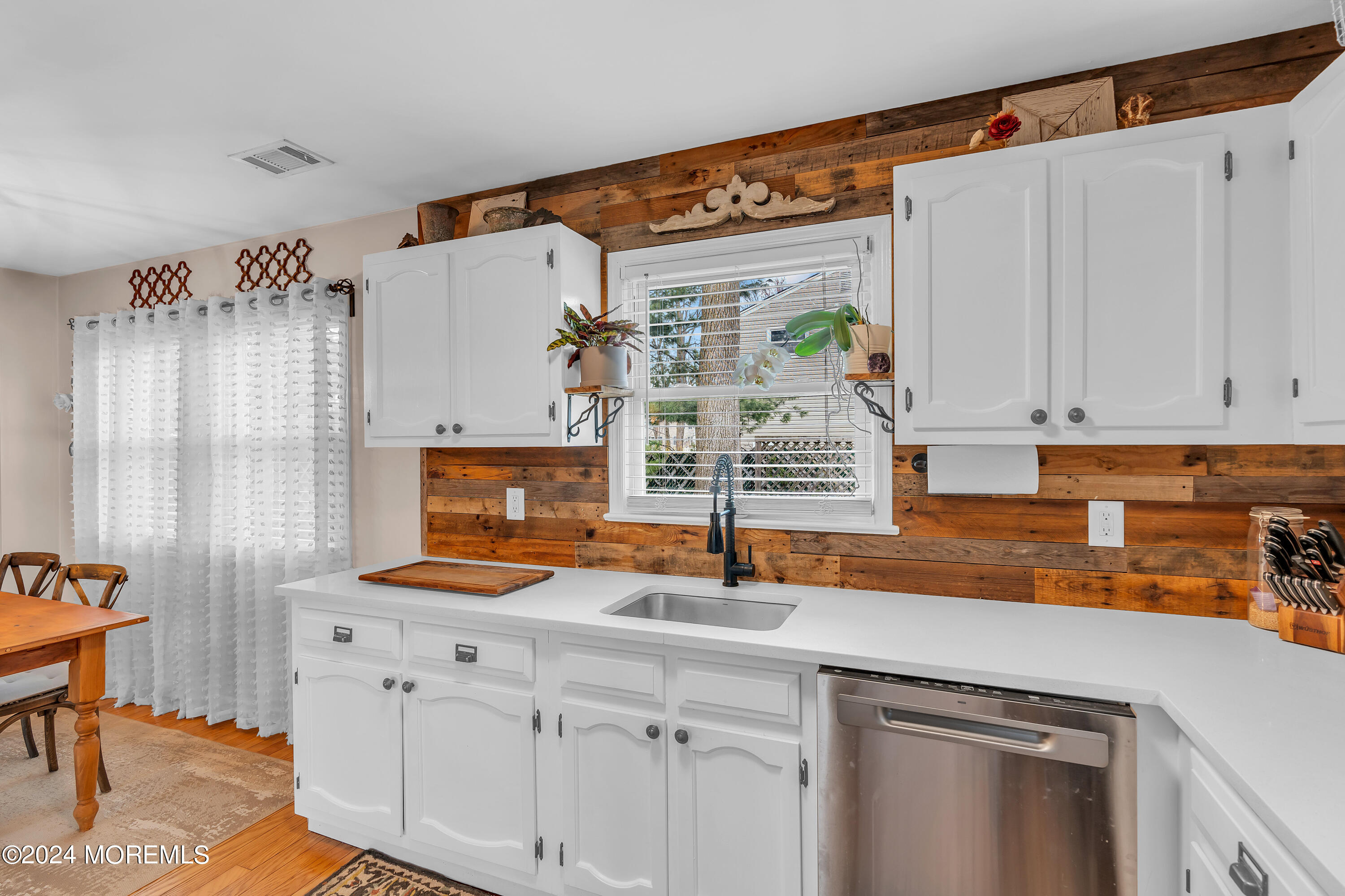 70 Portland Road Atlantic Highlands, NJ 07716 - Photo 11 of 32 a kitchen with stainless steel appliances granite countertop a sink and a cabinets