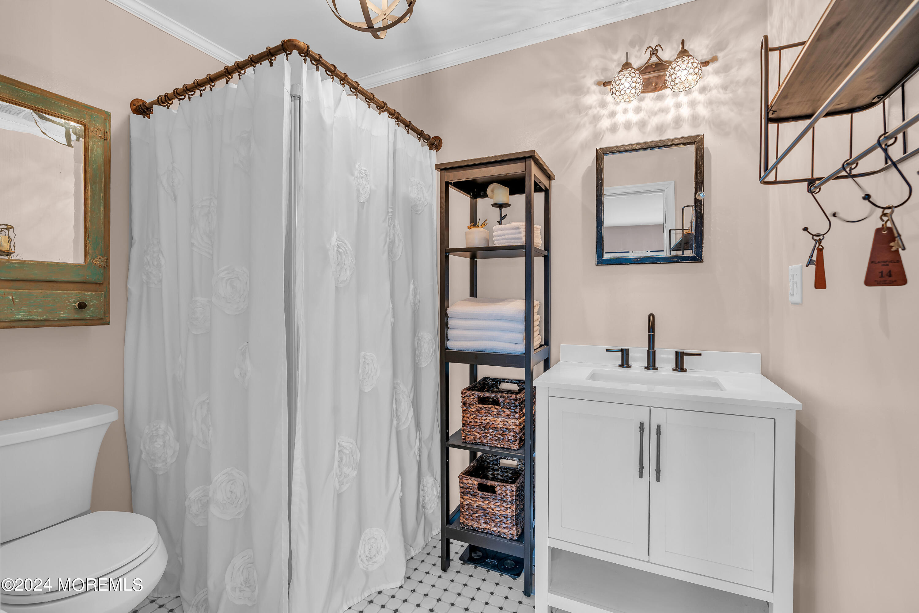 70 Portland Road Atlantic Highlands, NJ 07716 - Photo 20 of 32 a bathroom with a sink a toilet and shower