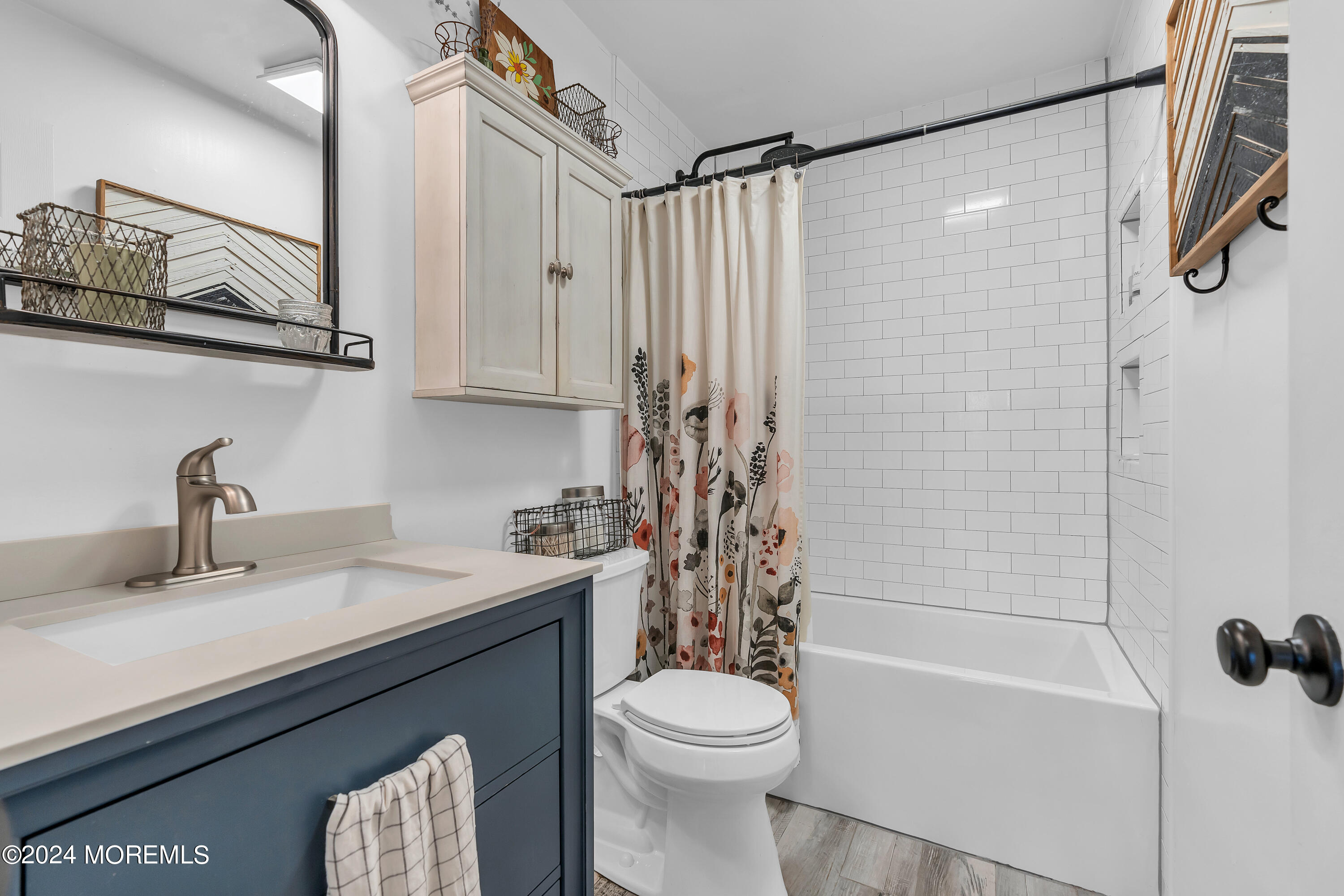 70 Portland Road Atlantic Highlands, NJ 07716 - Photo 22 of 32 a bathroom with a sink a toilet and shower