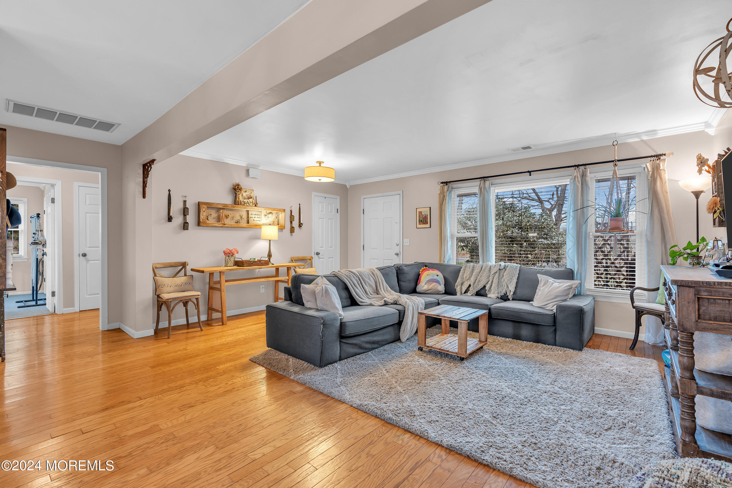 70 Portland Road Atlantic Highlands, NJ 07716 - Photo 7 of 32 a living room with fireplace furniture and a large window