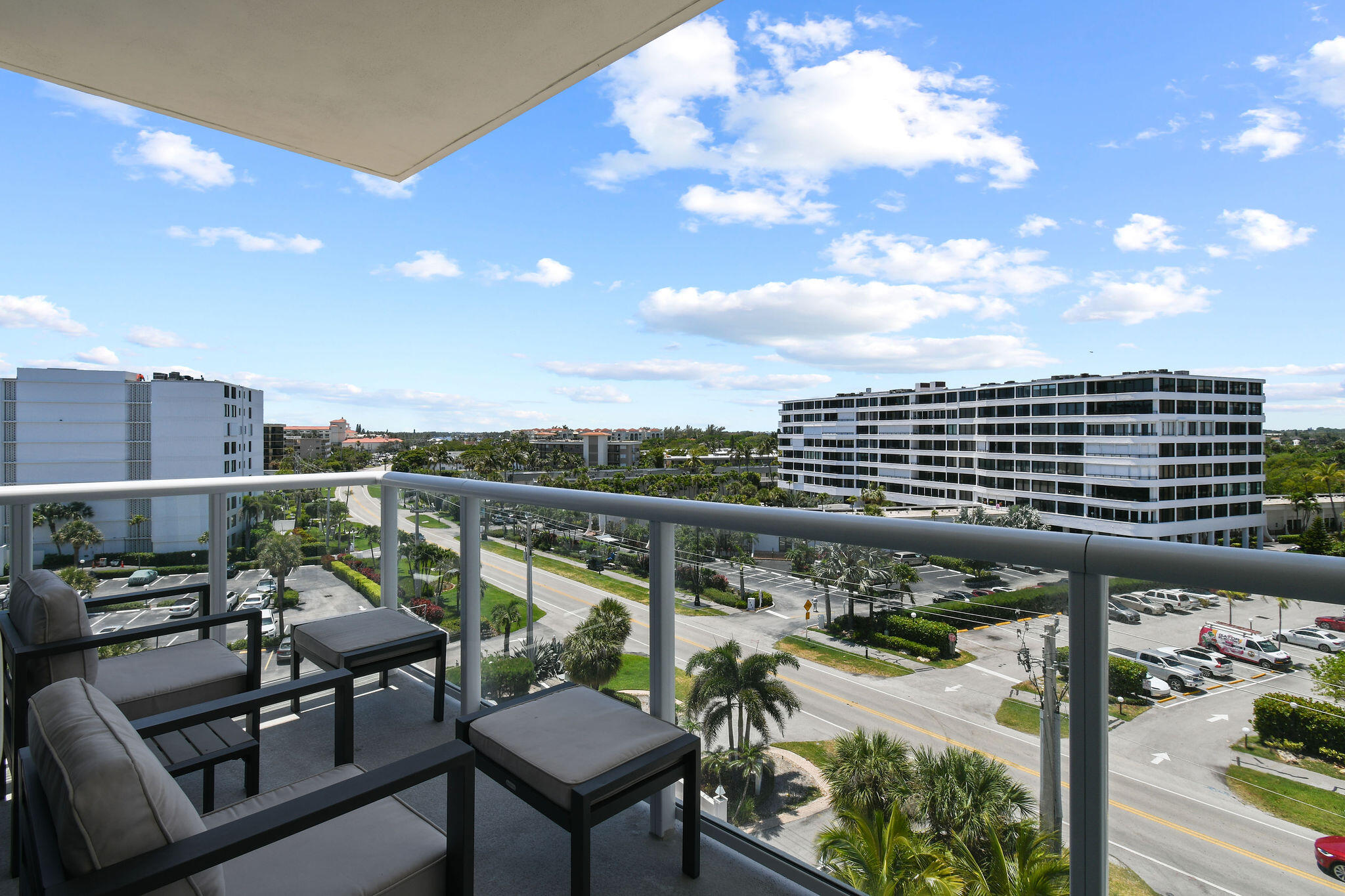 3550 South Ocean Boulevard, Unit 5E South Palm Beach, FL 33480 - Photo 15 of 52 a view of a balcony with furniture