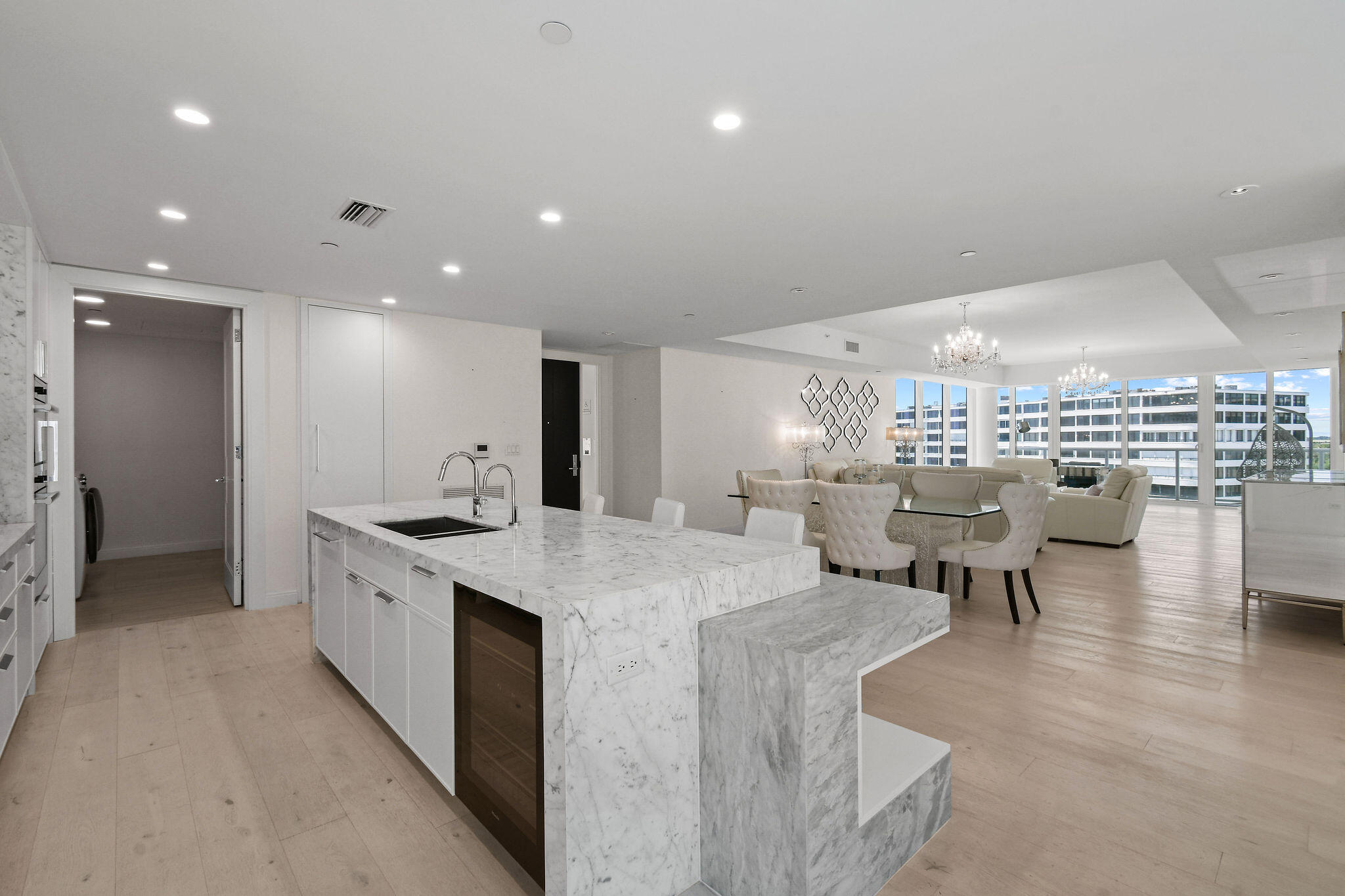 3550 South Ocean Boulevard, Unit 5E South Palm Beach, FL 33480 - Photo 19 of 52 a large kitchen with a large counter top furniture and kitchen view