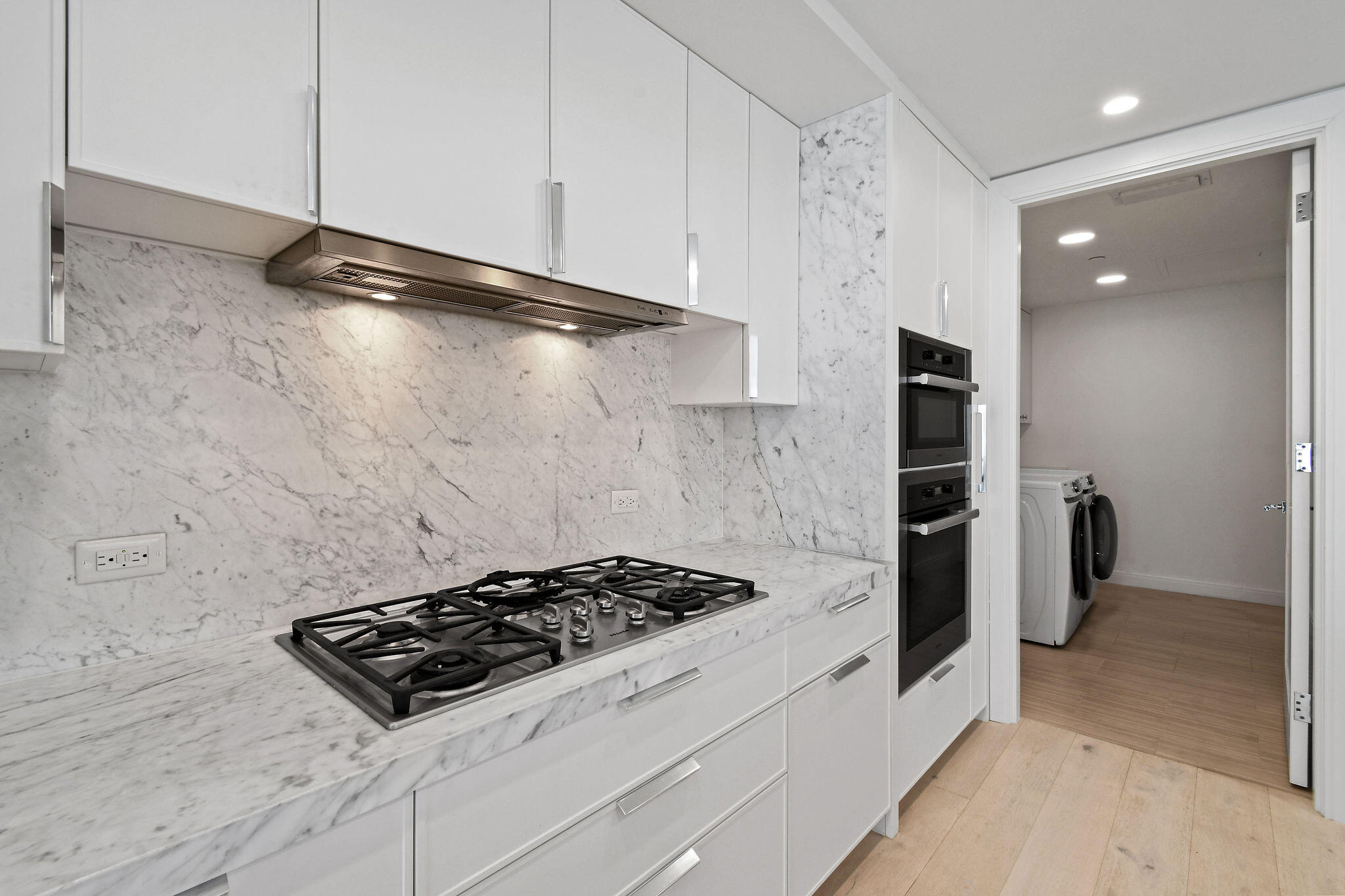 3550 South Ocean Boulevard, Unit 5E South Palm Beach, FL 33480 - Photo 20 of 52 a stove top oven sitting inside of a kitchen