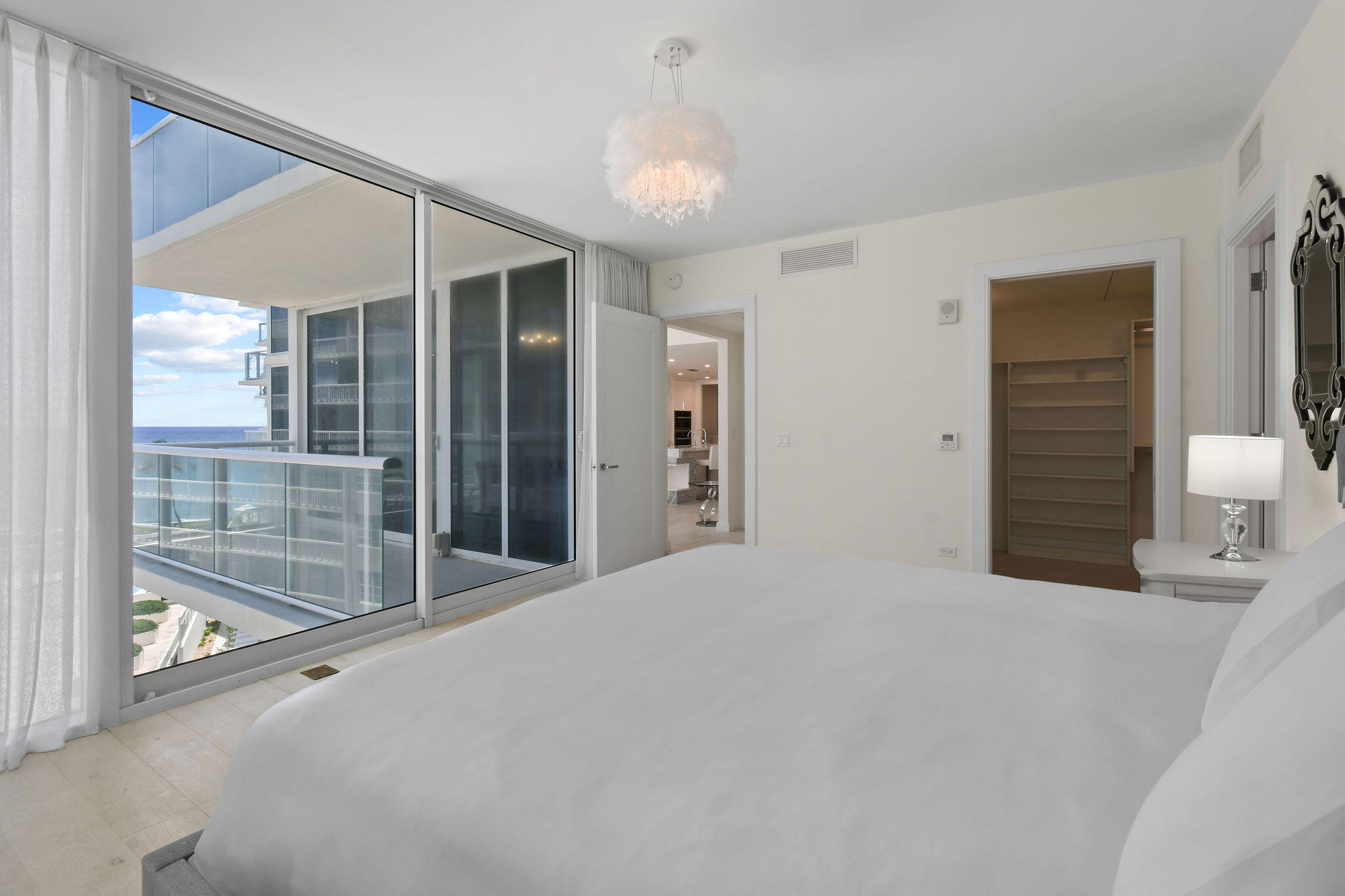 3550 South Ocean Boulevard, Unit 5E South Palm Beach, FL 33480 - Photo 27 of 52 a view of empty room with floor to ceiling window