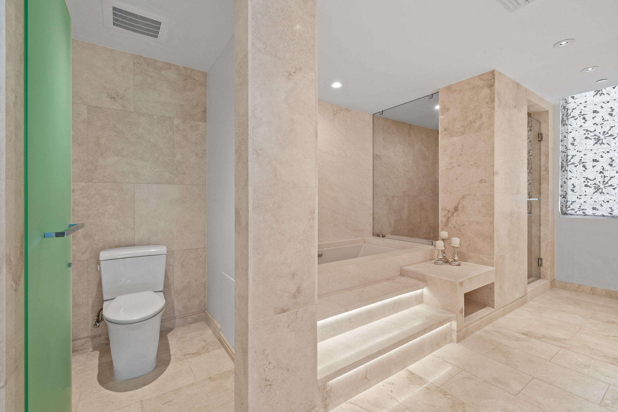 3550 South Ocean Boulevard, Unit 5E South Palm Beach, FL 33480 - Photo 29 of 52 a bathroom with a toilet tub and shower