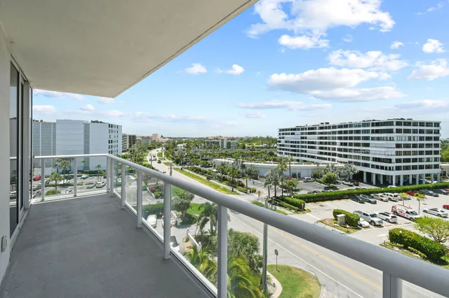 a spacious bathroom with a bathtub and shower