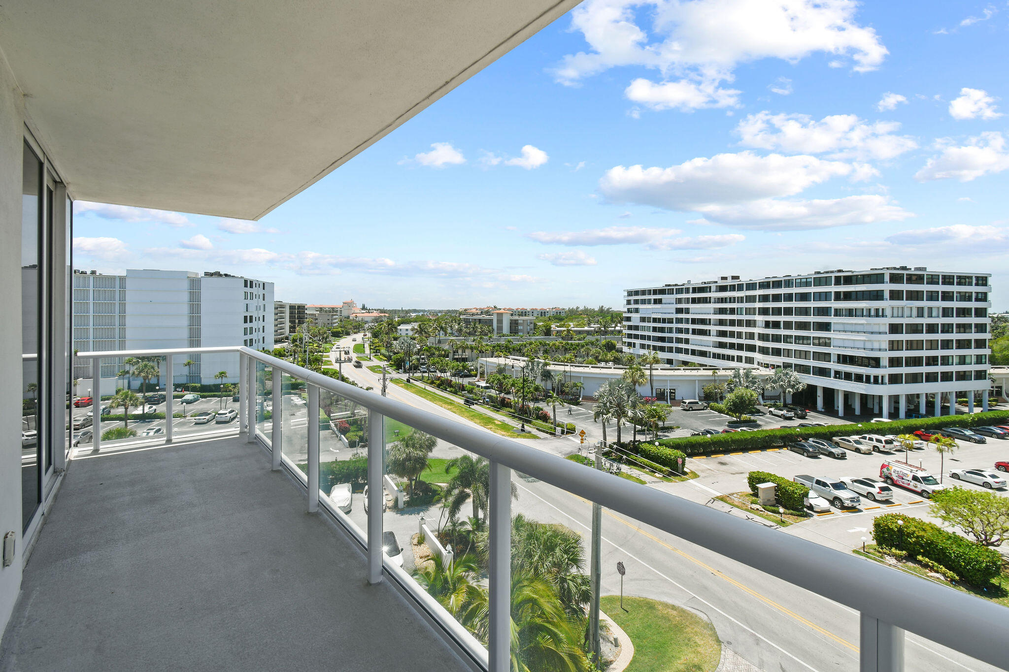 3550 South Ocean Boulevard, Unit 5E South Palm Beach, FL 33480 - Photo 38 of 52 a city view from a balcony