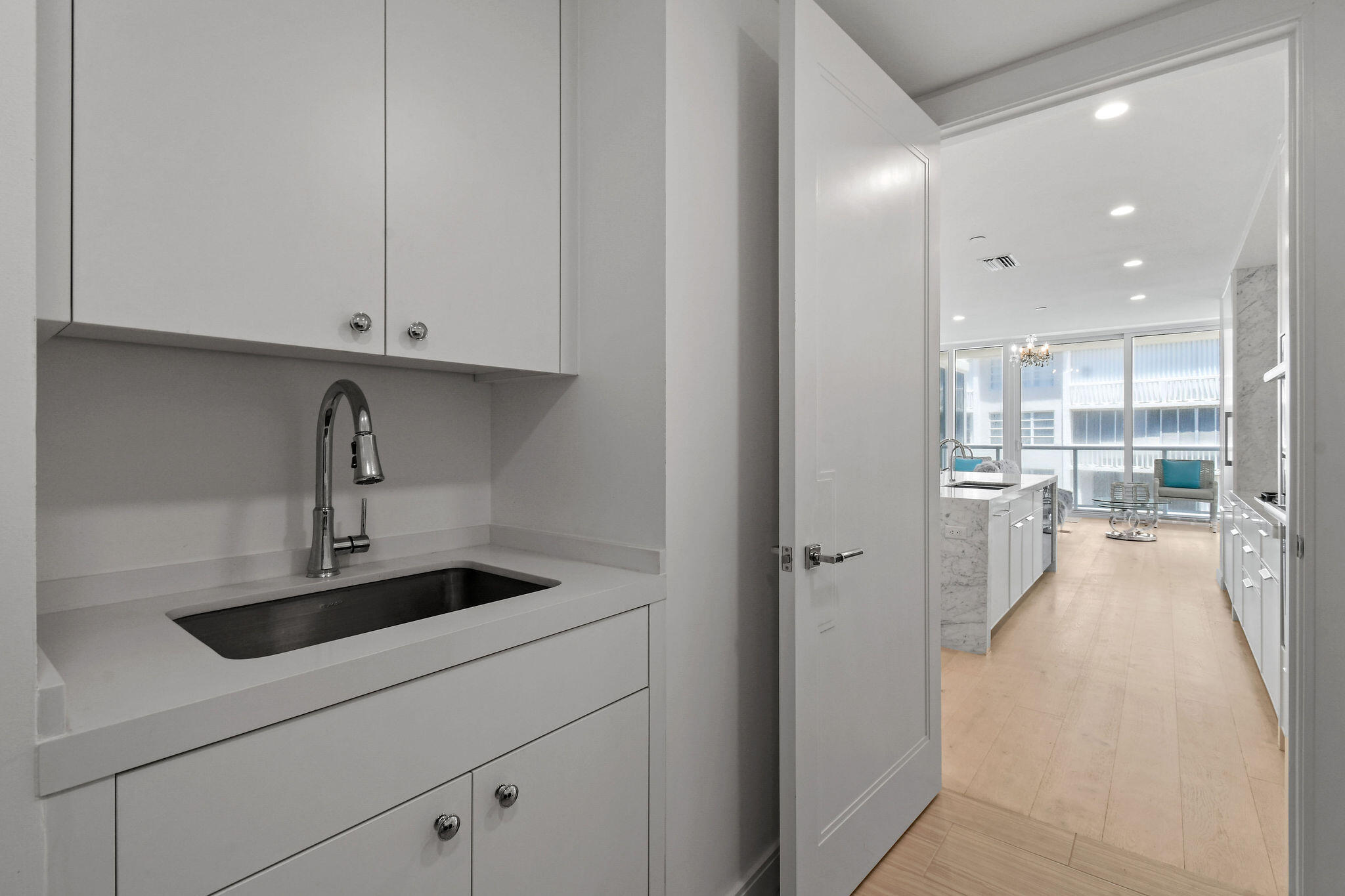 3550 South Ocean Boulevard, Unit 5E South Palm Beach, FL 33480 - Photo 44 of 52 a kitchen with refrigerator and window