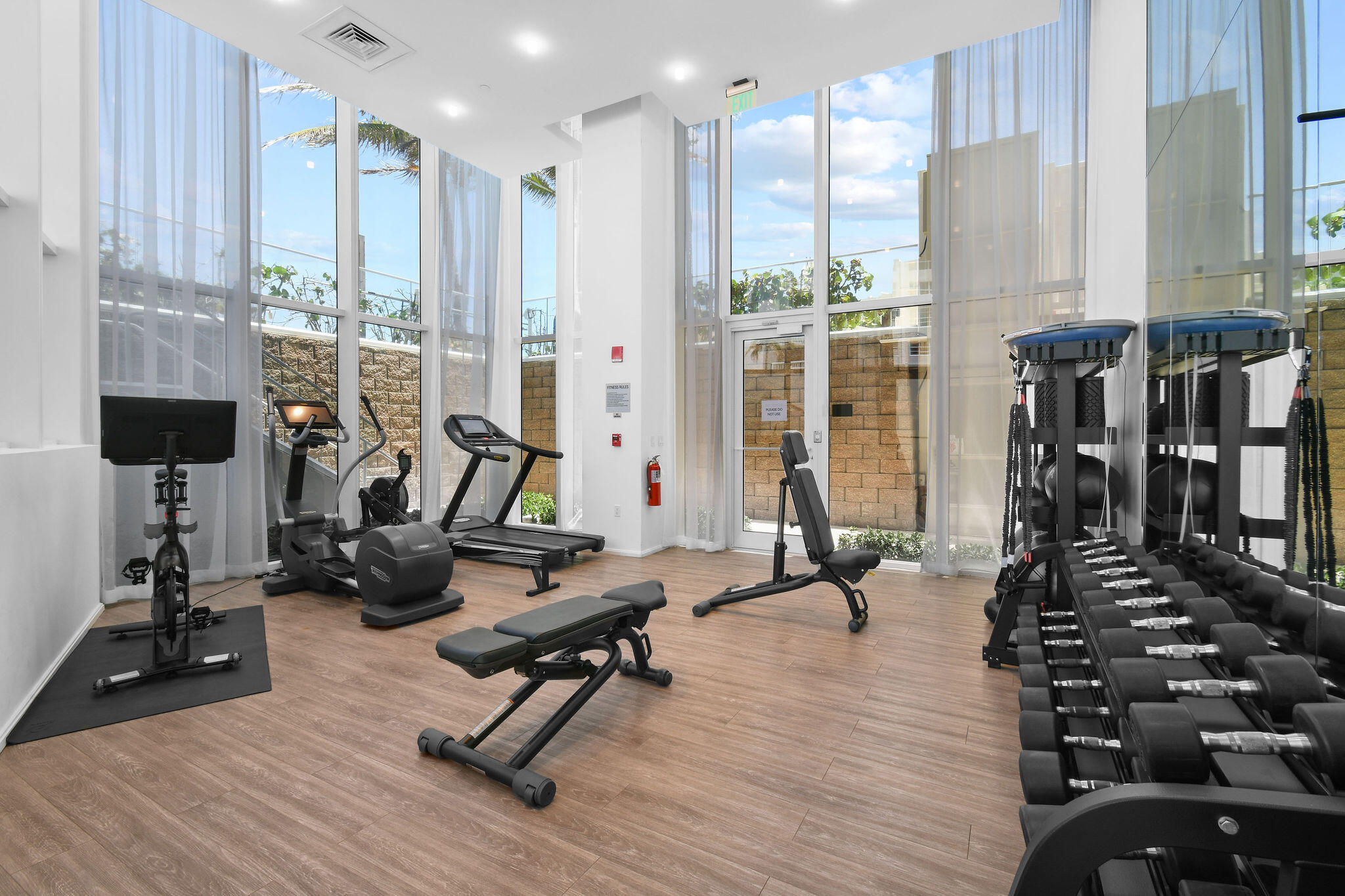 3550 South Ocean Boulevard, Unit 5E South Palm Beach, FL 33480 - Photo 45 of 52 a view of a room with gym equipment