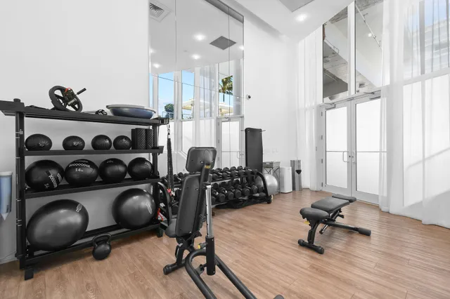 a view of a swimming pool with a lounge chair