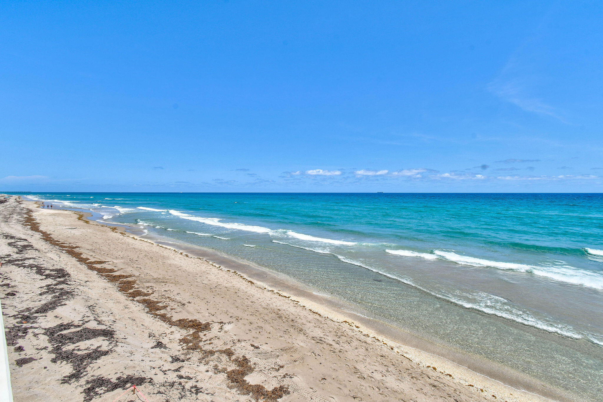 3550 South Ocean Boulevard, Unit 5E South Palm Beach, FL 33480 - Photo 51 of 52 a view of an ocean and a beach