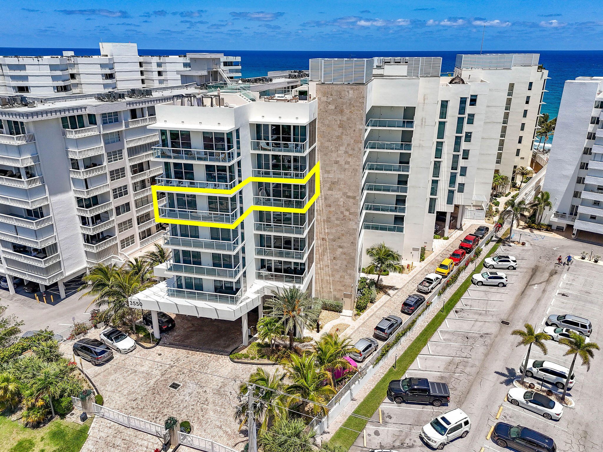 3550 South Ocean Boulevard, Unit 5E South Palm Beach, FL 33480 - Photo 7 of 52 a view of a building with glass windows