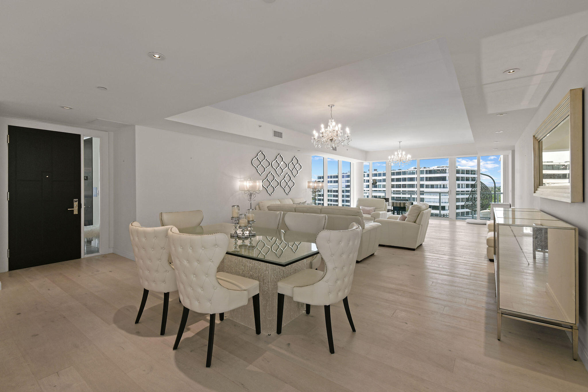 3550 South Ocean Boulevard, Unit 5E South Palm Beach, FL 33480 - Photo 10 of 52 a view of a dining room with furniture